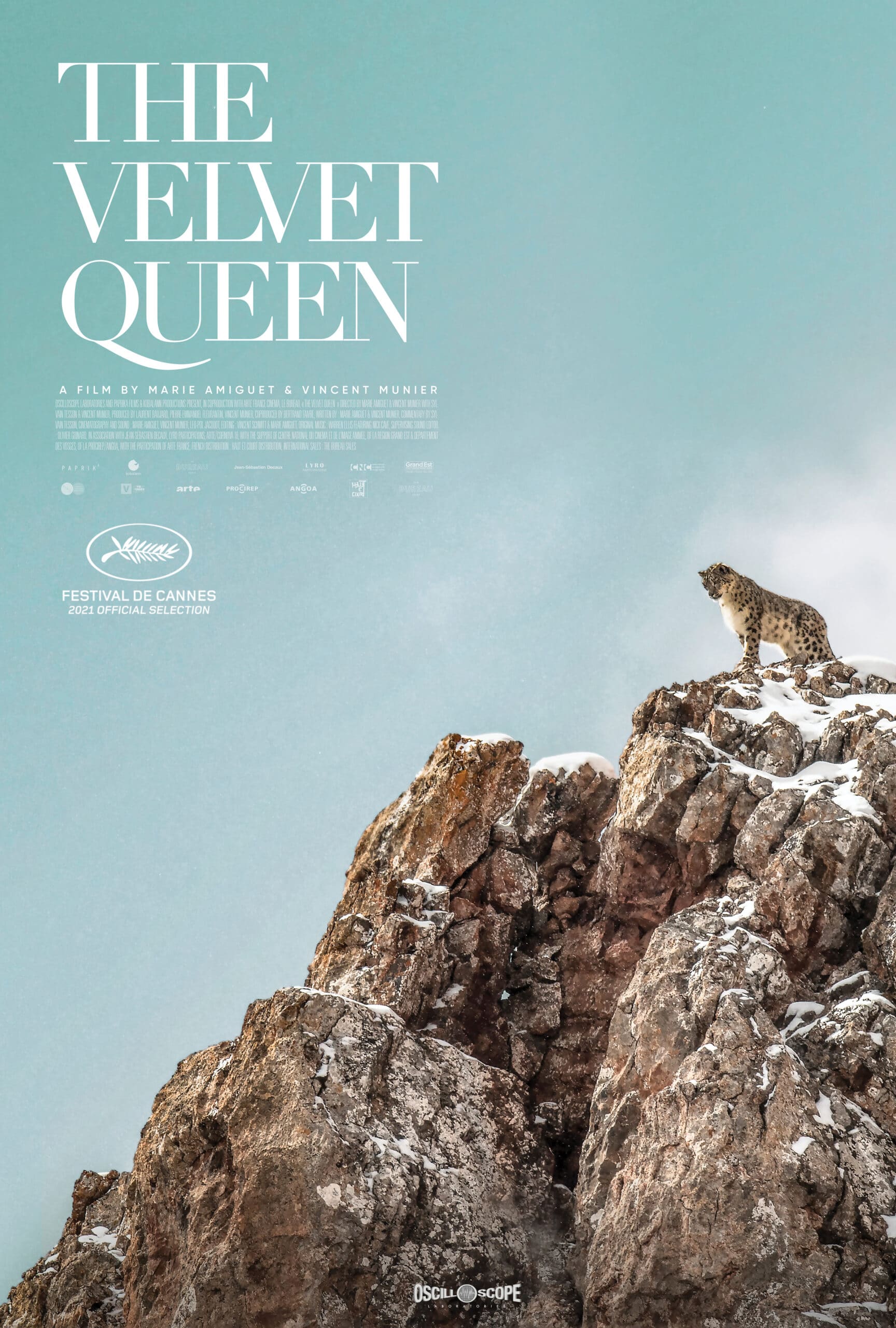 The Velvet Queen with a leopard at the top