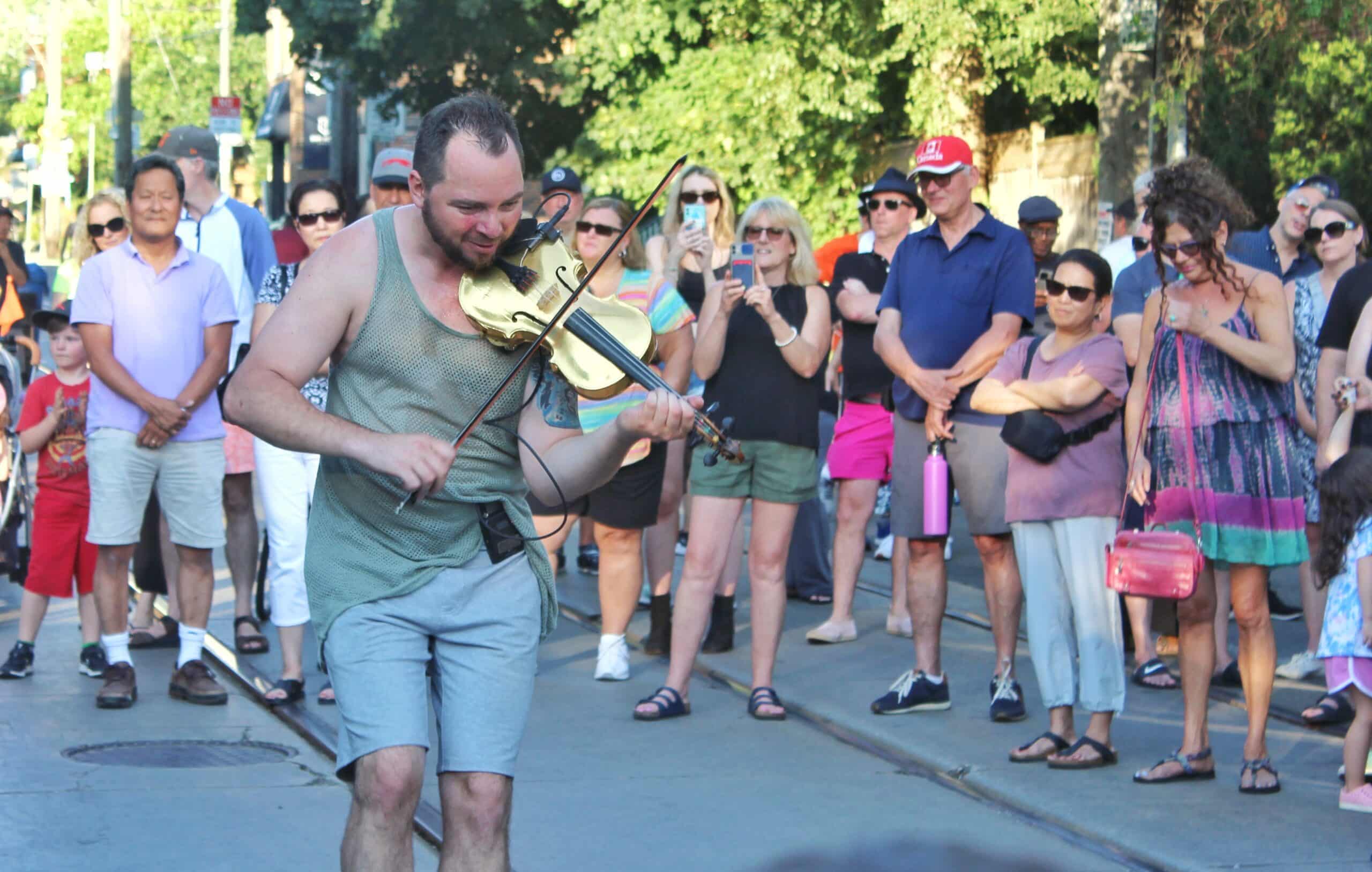 A violinist plays in the street